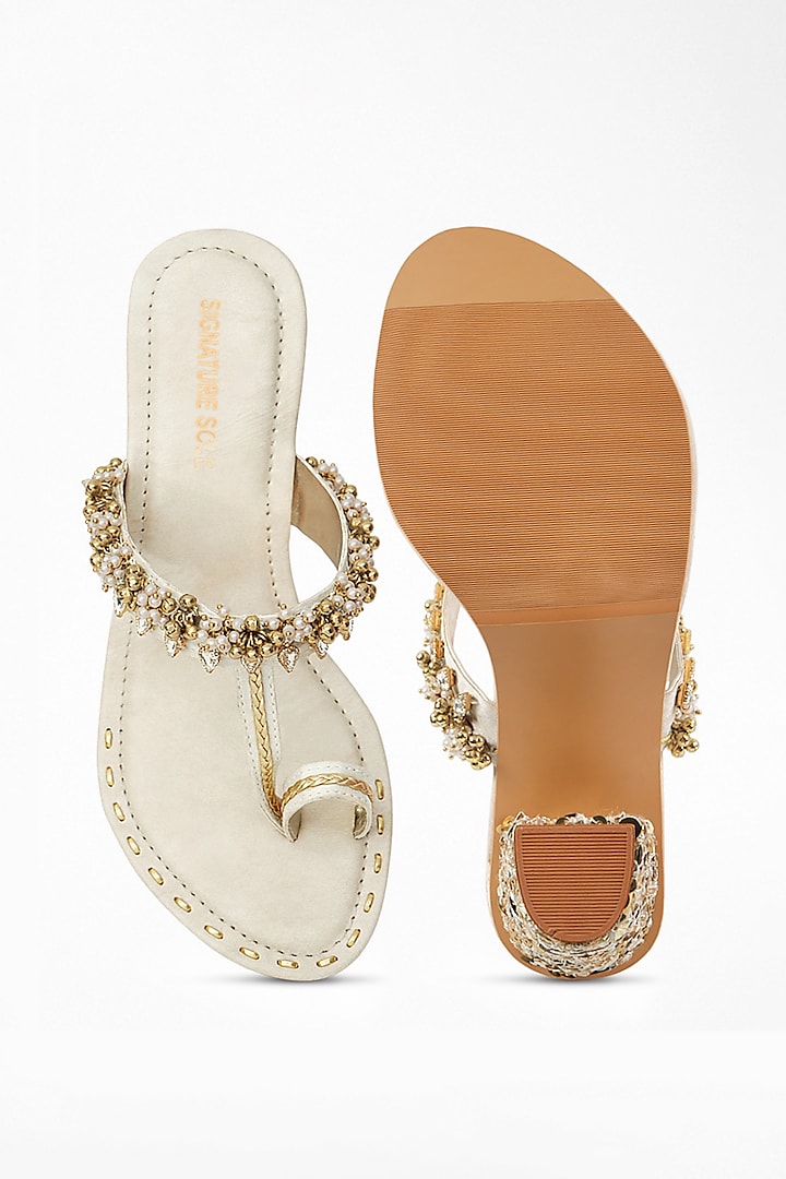 White Anti-Slippery Rubber Embroidered Block Heels by Signature Sole at Pernia's Pop Up Shop