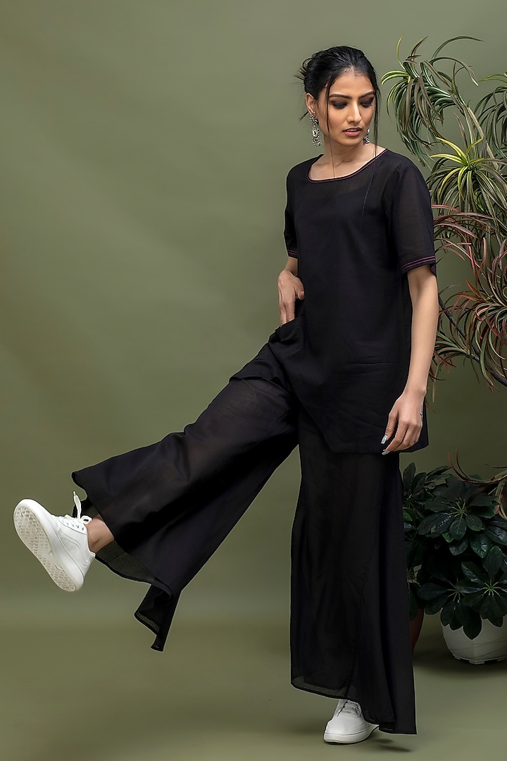 Black Flared Cotton Pants by Smriti Gupta at Pernia's Pop Up Shop