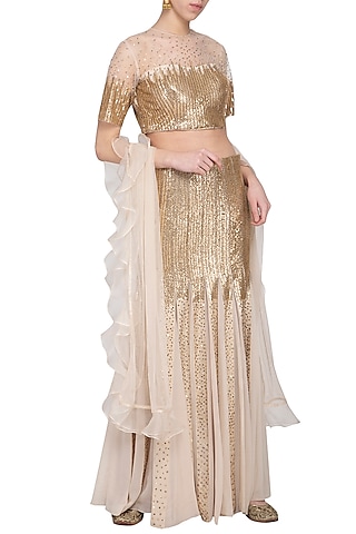 Beige embroidered lehenga set by Sanya Gulati