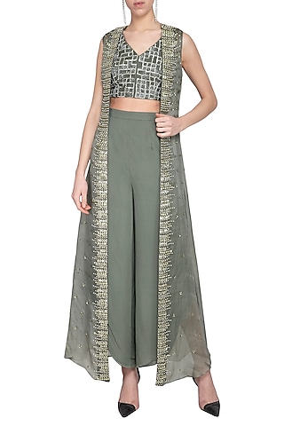 Green embroidered crop top with pants and cape by Sanya Gulati