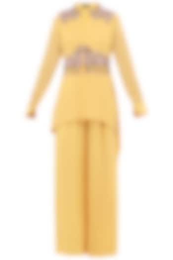 Pale yellow asymmetrical embroidered shirt with palazzo pants available only at Pernia's Pop Up Shop.
