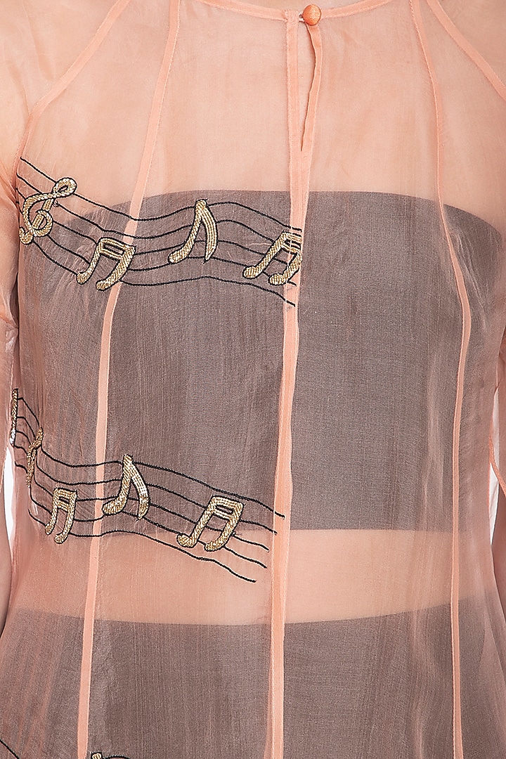 Peach musical note trench coat by Shilpi Gupta Surkhab at Pernia's Pop Up Shop