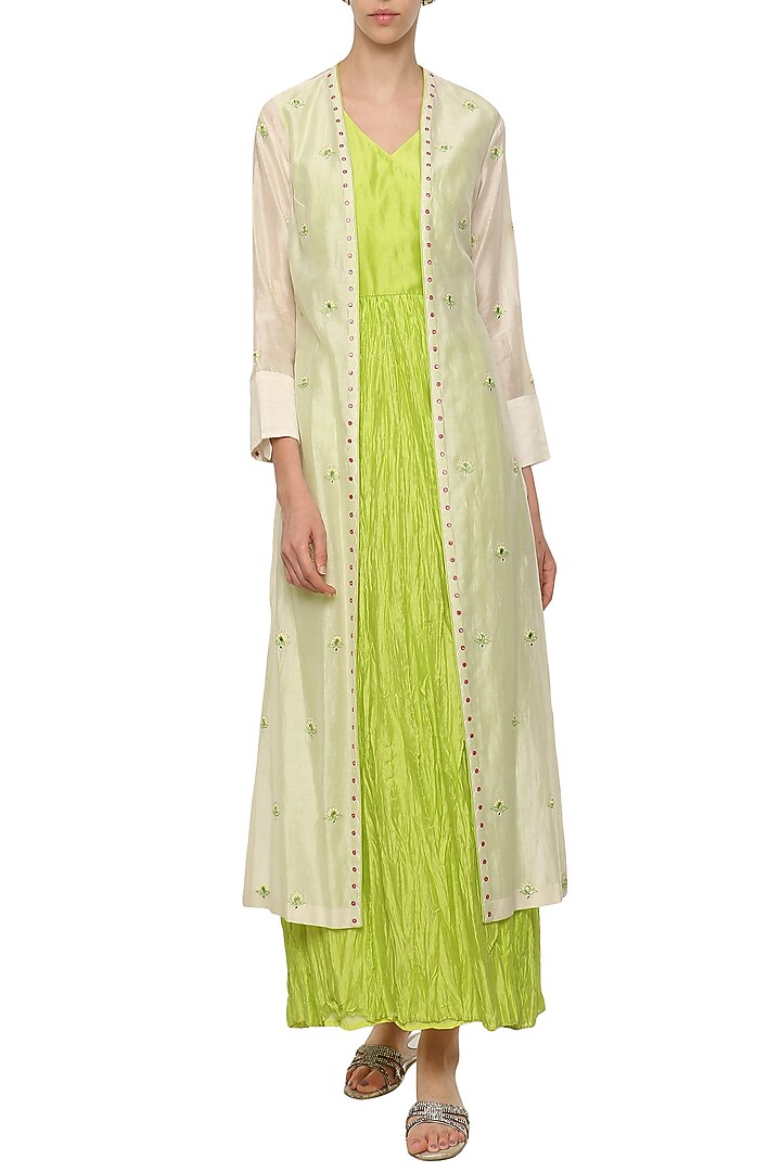 Neon green crushed maxi dress with ivory embroidered jacket available only at Pernia's Pop Up Shop.