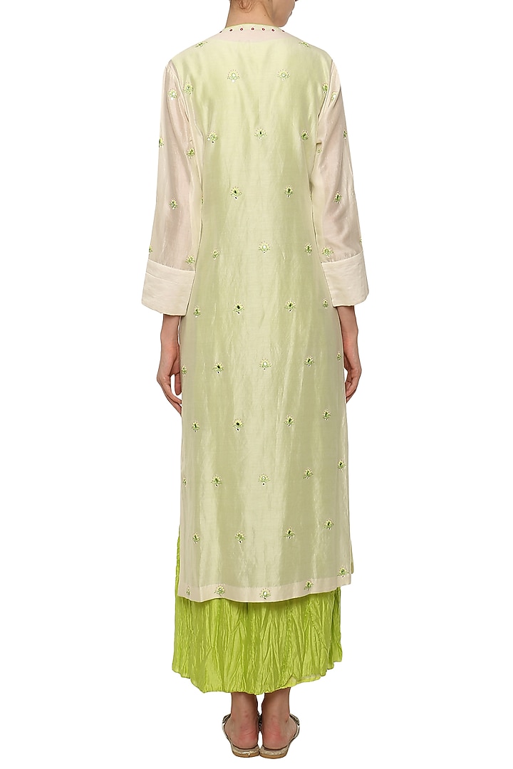 Neon green crushed maxi dress with ivory embroidered jacket available only at Pernia's Pop Up Shop.