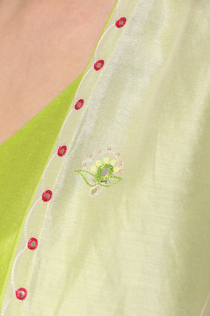 Neon green crushed maxi dress with ivory embroidered jacket available only at Pernia's Pop Up Shop.