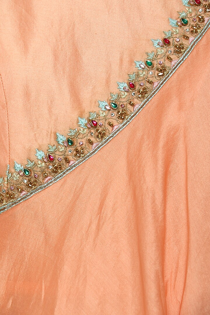Orange asymmetrical embroidered drape kurta with churidar pants available only at Pernia's Pop Up Shop.