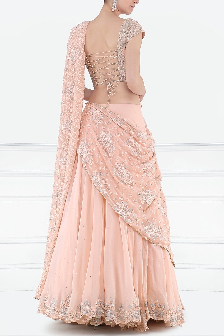 Peach lehenga saree with embroidered blouse available only at Pernia's Pop Up Shop.