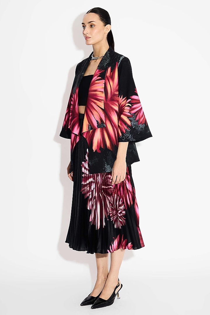 Black Poly Satin Floral Pleated Skirt by Shasha Gaba at Pernia's Pop Up Shop