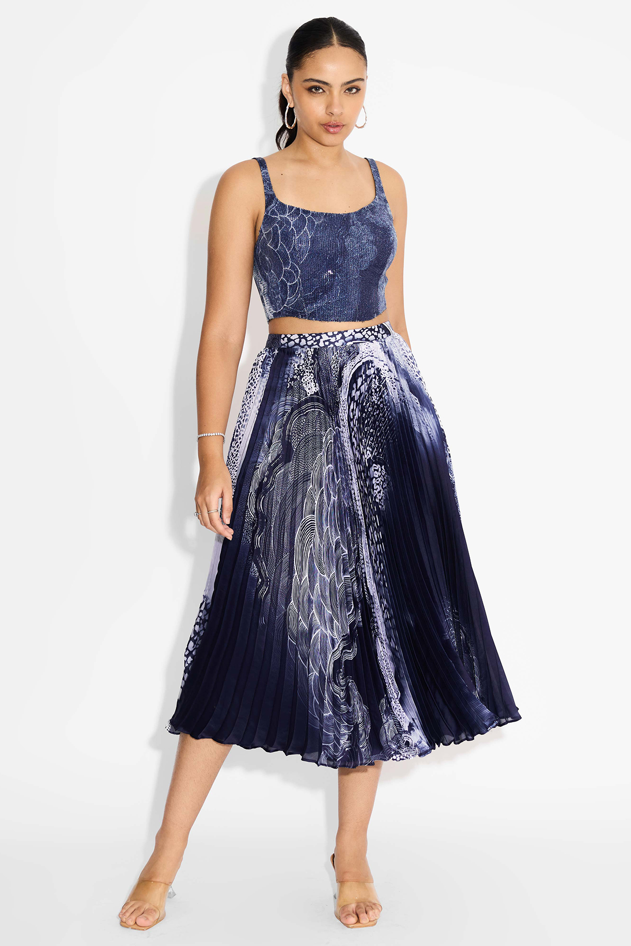Obsidian Blue Poly Satin Swirl Printed Pleated Skirt by Shasha Gaba at Pernia's Pop Up Shop