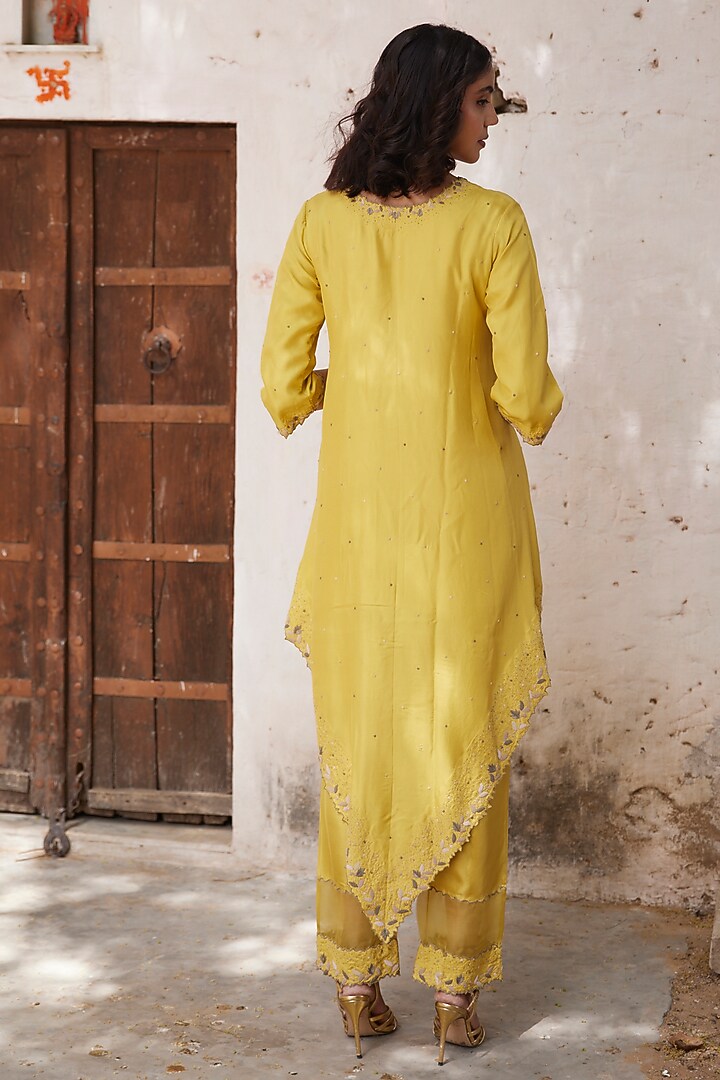 Yellow Silk Twill Hand Embroidered Asymmetrical Kurta Set by Shay by Shubham Tak at Pernia's Pop Up Shop