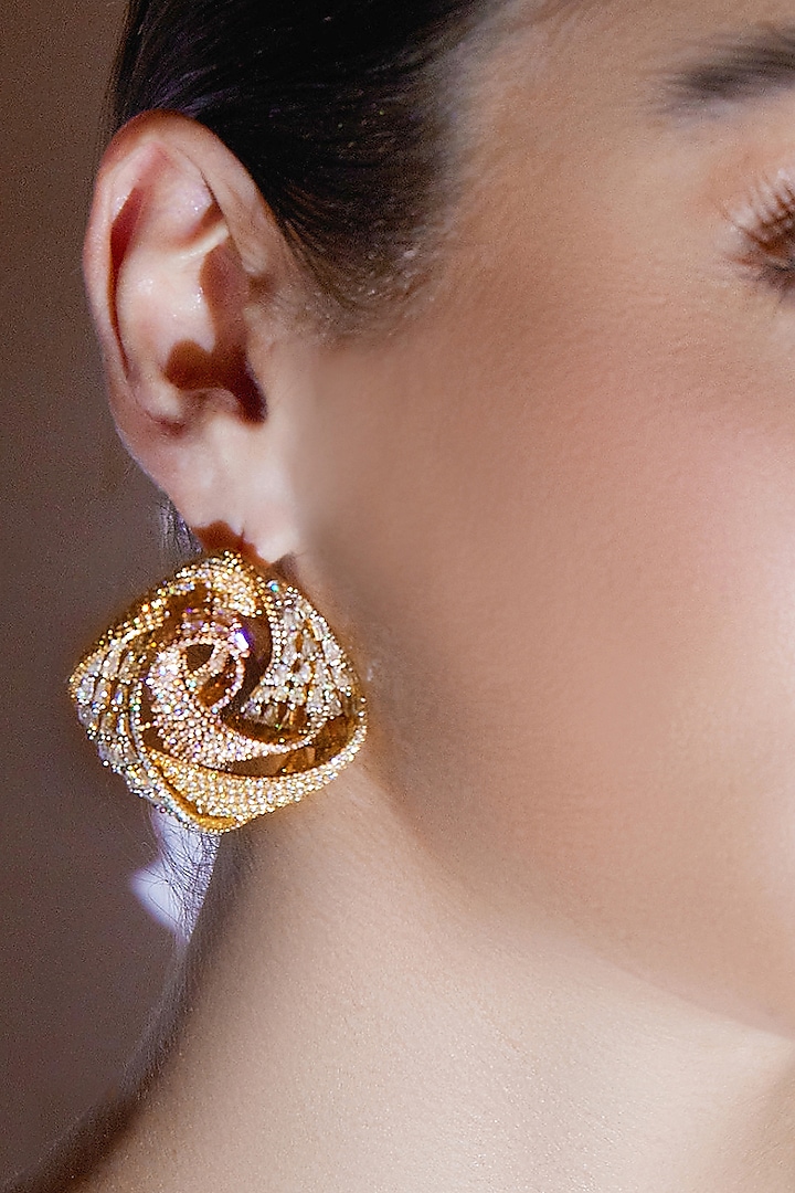 Gold Finish Zircon Orbit Glow Stud Earrings by Shaze Jewellery