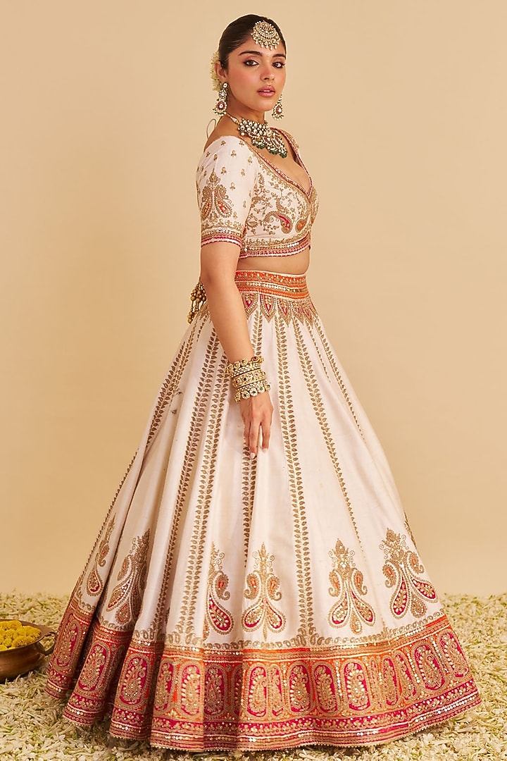 Daisy Ivory Pure Raw Silk Kashmiri Tilla Embroidered Bridal Lehenga Set by Sheetal Batra at Pernia's Pop Up Shop