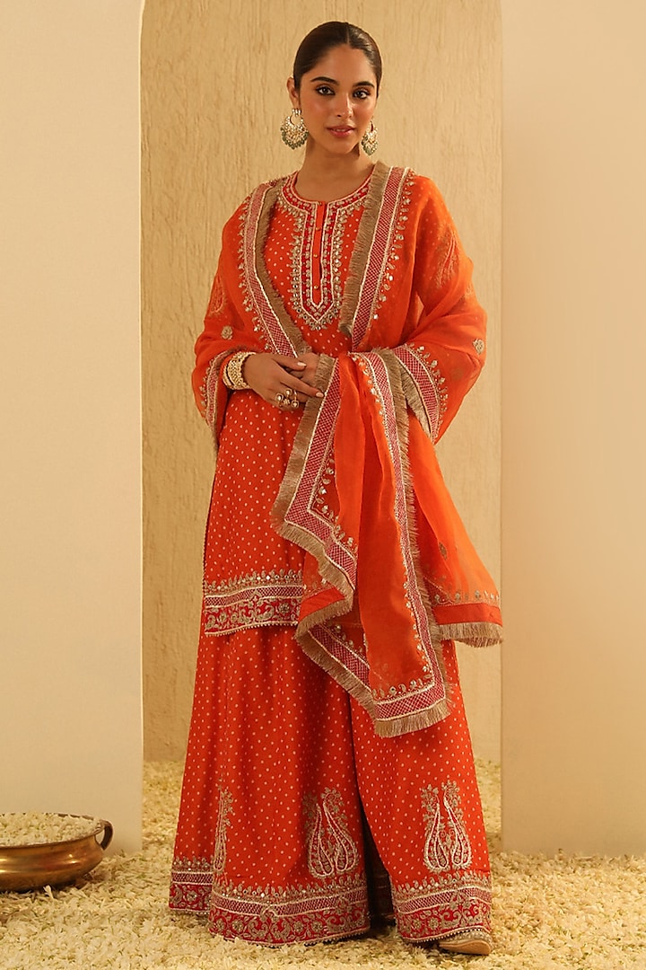Orange Upada Silk Kashmiri Tilla Embroidered Bandhej Wedding Sharara Set by Sheetal Batra at Pernia's Pop Up Shop