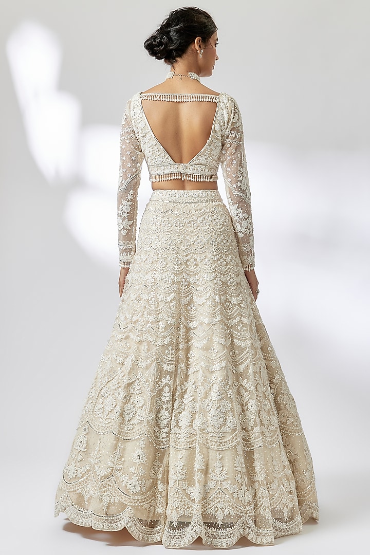 Ivory Net Cutdana Embroidered Bridal Lehenga Set by Shlok Design at Pernia's Pop Up Shop