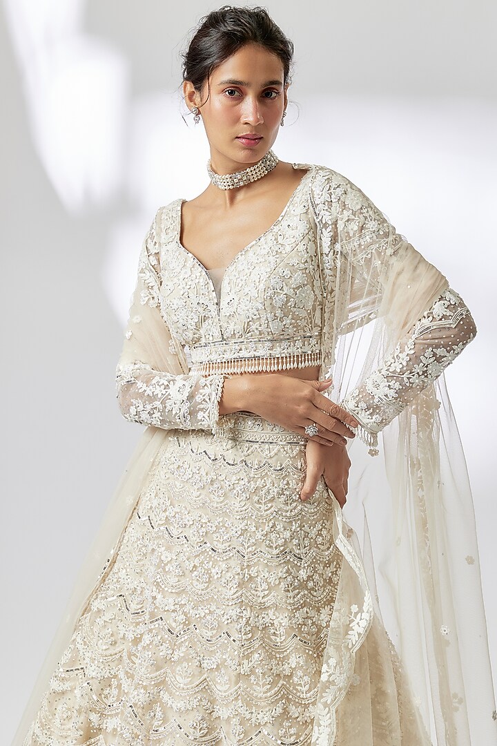 Ivory Net Cutdana Embroidered Bridal Lehenga Set by Shlok Design at Pernia's Pop Up Shop