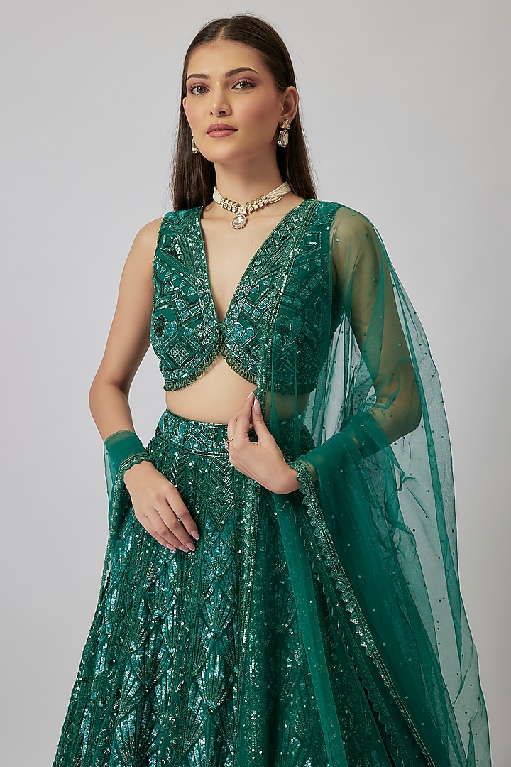Emerald Green Net Sequins Embroidered Bridal Lehenga Set by Shlok Design at Pernia's Pop Up Shop