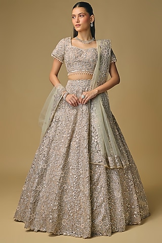 Ivory Net Thread & Pearl Embroidered Lehenga Set by Shlok Design