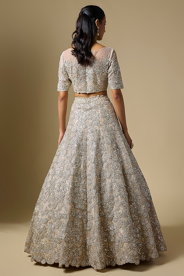 Ivory Net Badla Embroidered Bridal Lehenga Set by Shlok Design at Pernia's Pop Up Shop