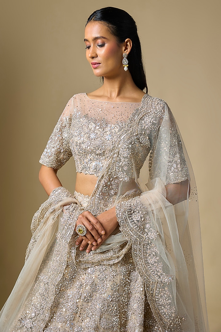 Ivory Net Badla Embroidered Bridal Lehenga Set by Shlok Design at Pernia's Pop Up Shop