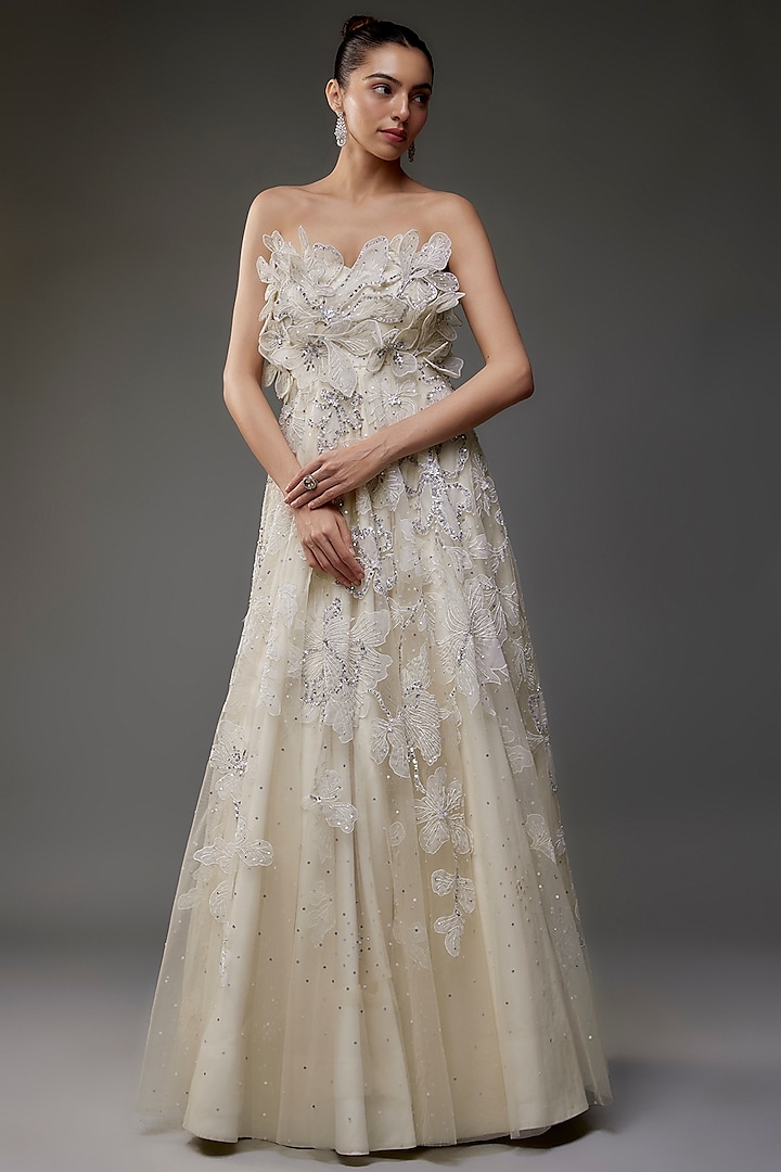 Off-White Net Floral Applique Embroidered Gown by Shlok Design