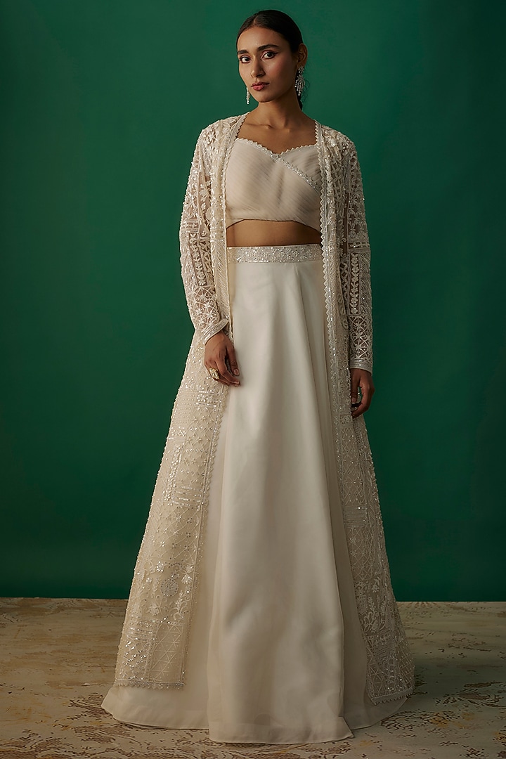 Ivory Net & Organza Sequins Embroidered Jacket Wedding Lehenga Set by Shlok Design at Pernia's Pop Up Shop