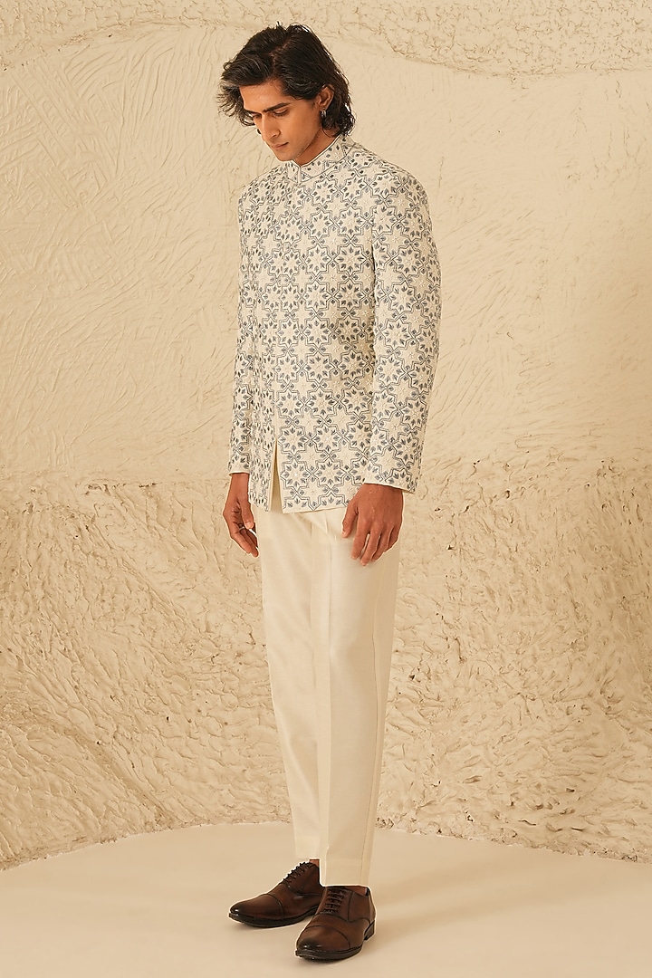 Ivory Dupion Silk Embroidered Groom Bandhgala Set by Shreyansh Designs at Pernia's Pop Up Shop
