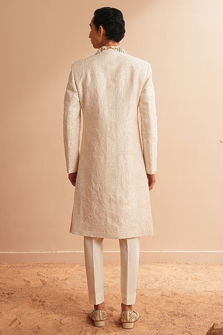Milky White Dupion Silk Embroidered Groom Sherwani Set by Shreyansh Designs at Pernia's Pop Up Shop