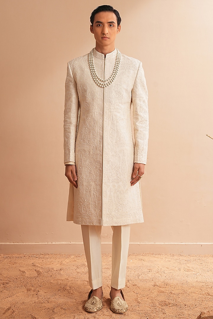 Milky White Dupion Silk Embroidered Groom Sherwani Set by Shreyansh Designs at Pernia's Pop Up Shop