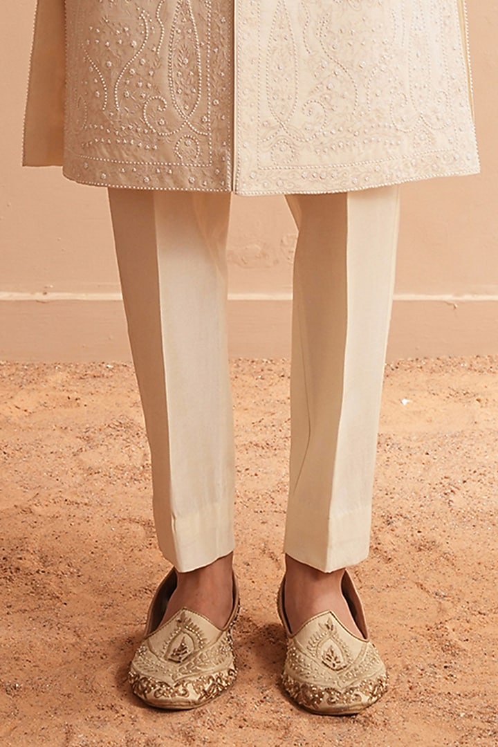 Milky White Dupion Silk Embroidered Groom Sherwani Set by Shreyansh Designs at Pernia's Pop Up Shop