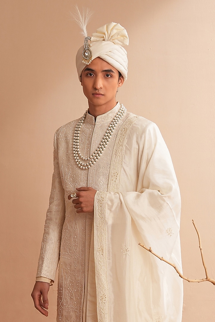 Milky White Dupion Silk Embroidered Groom Sherwani Set by Shreyansh Designs at Pernia's Pop Up Shop