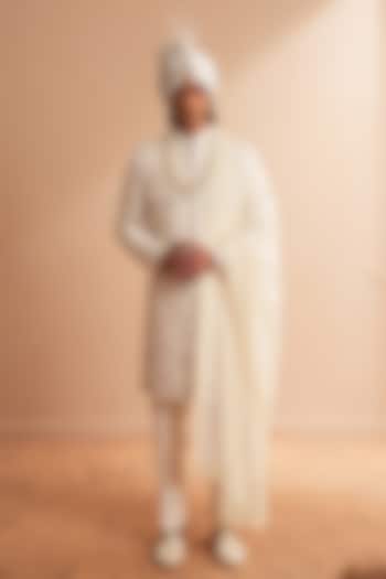Milky White Dupion Silk Floral Embroidered Groom Sherwani Set by Shreyansh Designs at Pernia's Pop Up Shop