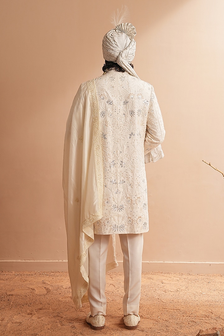 Milky White Dupion Silk Floral Embroidered Groom Sherwani Set by Shreyansh Designs at Pernia's Pop Up Shop