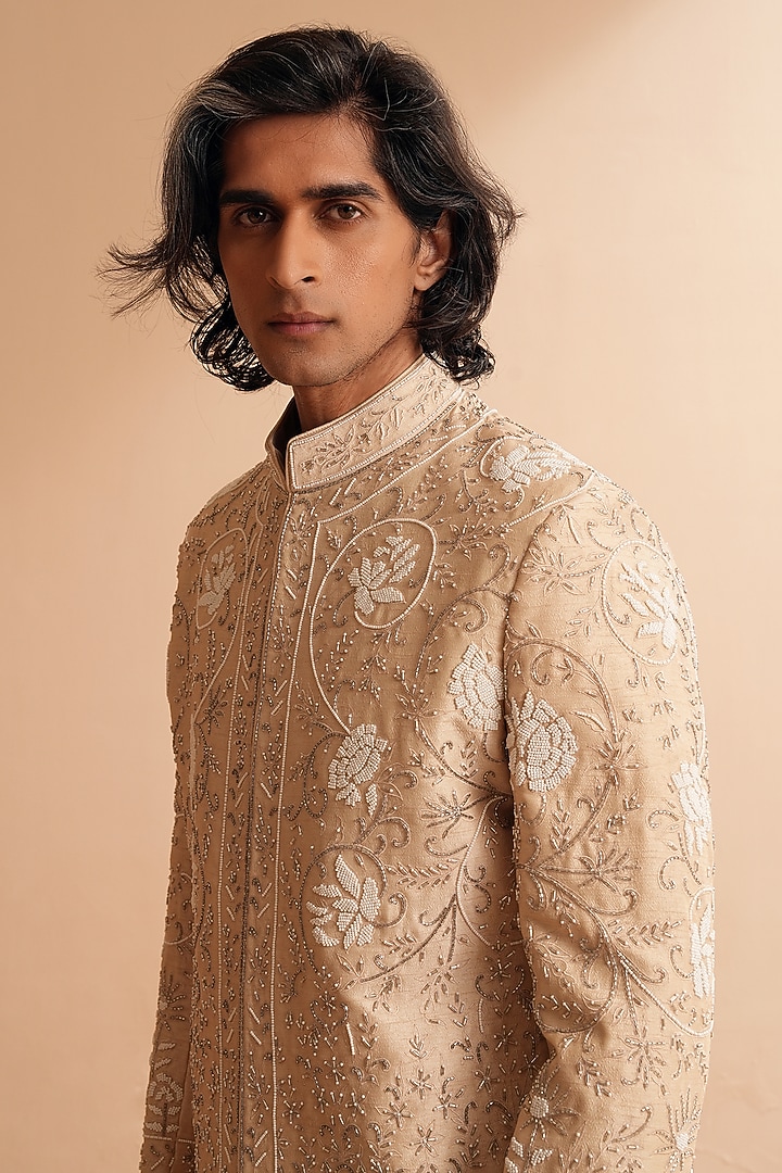 Nude-Toned Dupion Silk Floral Embroidered Groom Sherwani Set by Shreyansh Designs at Pernia's Pop Up Shop