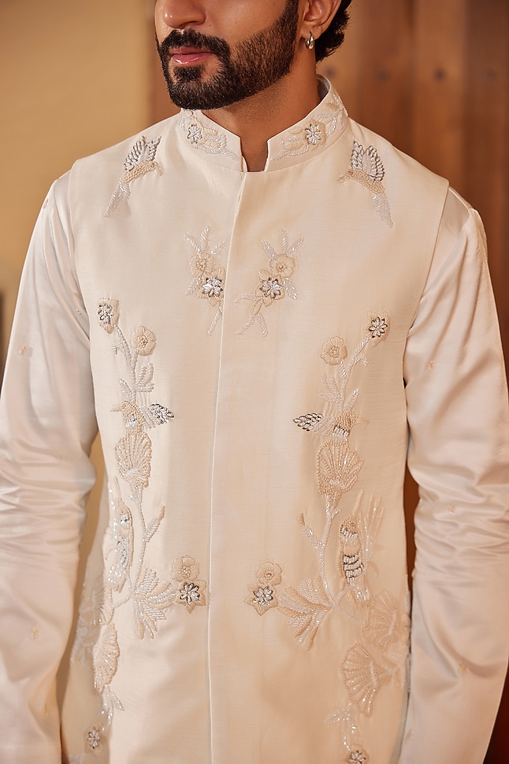 Milky White Dupion Silk Floral Embroidered Nehru Jacket Set by Shreyansh Designs at Pernia's Pop Up Shop