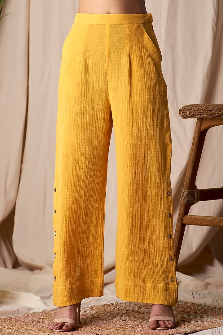 Turmeric Yellow Dobby Pants by Shivika Agarwal at Pernia's Pop Up Shop