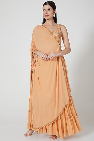 Orange Ruffled Skirt Set With Embroidered Blouse by Shivangi Jain