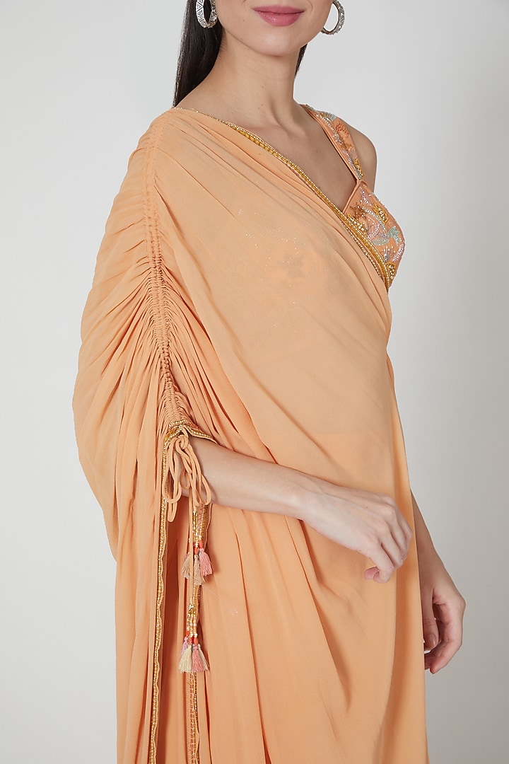 Orange Ruffled Skirt Set With Embroidered Blouse by Shivangi Jain at Pernia's Pop Up Shop