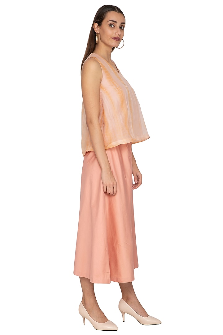 Peach Cotton Satin Flared Pants by Shiori at Pernia's Pop Up Shop