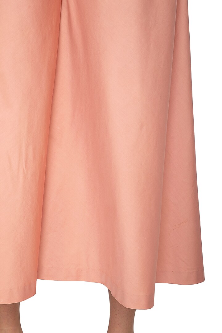 Peach Cotton Satin Flared Pants by Shiori at Pernia's Pop Up Shop