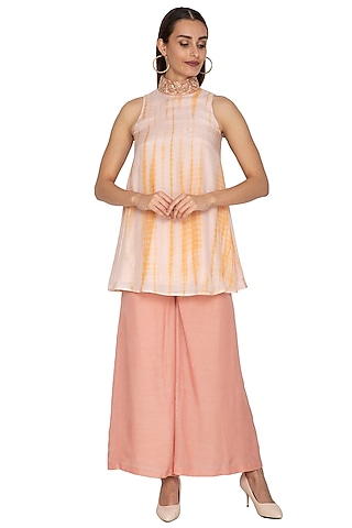 Peach Cotton Silk Flared Pants by Shiori