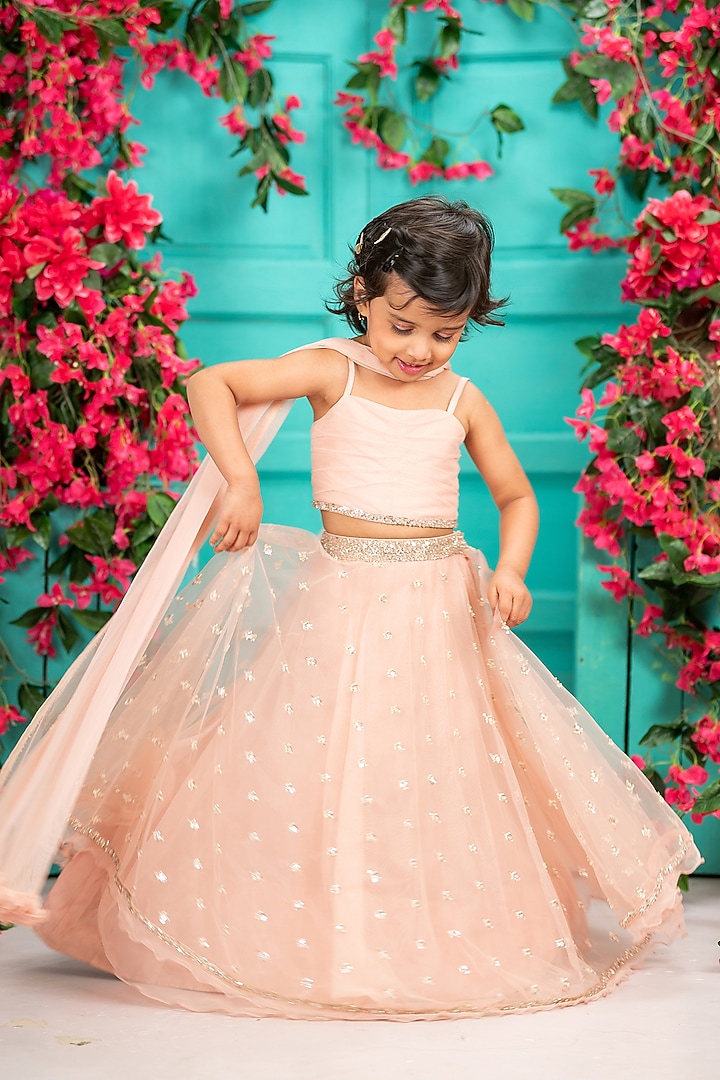 Soft Pink Net Embroidered Lehenga Set For Girls by SHRUTI JALAN at Pernia's Pop Up Shop