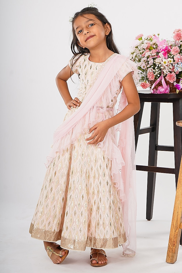 Light Pink Net Embroidered Lehenga Set For Girls by SHRUTI JALAN at Pernia's Pop Up Shop