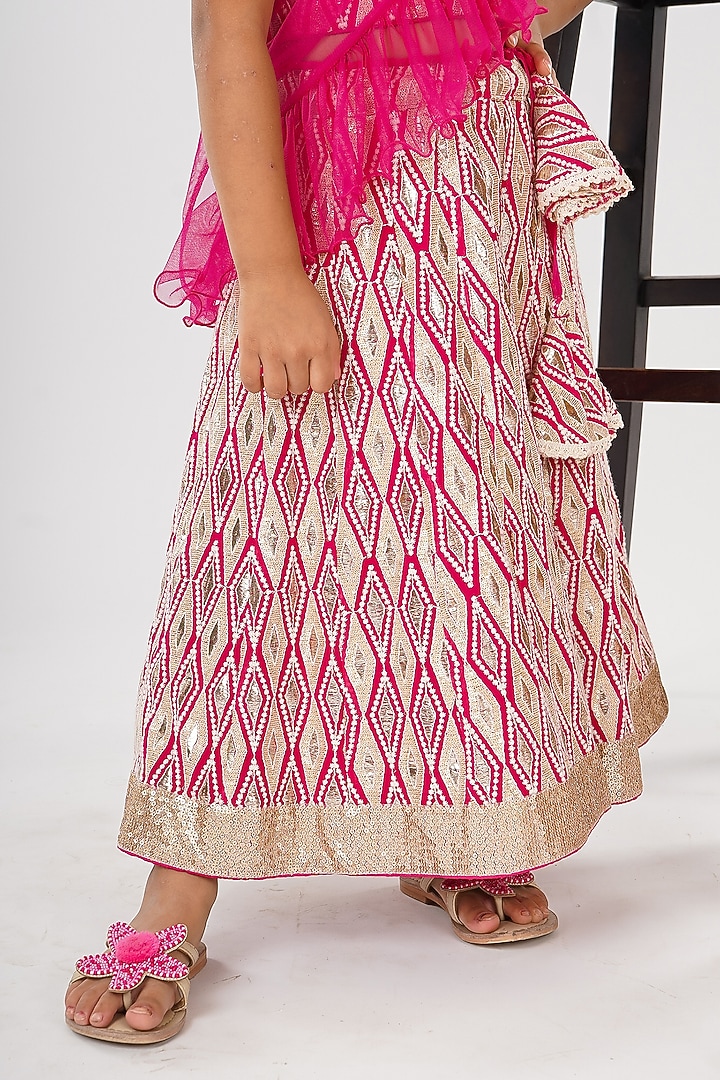 Rani Pink Net Embroidered Lehenga Set For Girls by SHRUTI JALAN at Pernia's Pop Up Shop