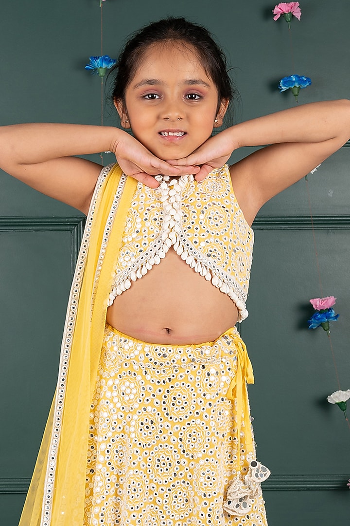 Yellow Georgette & Net Embroidered Lehenga Set For Girls by SHRUTI JALAN at Pernia's Pop Up Shop
