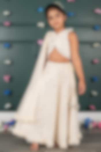 Nude Peach Georgette & Net Embroidered Lehenga Set For Girls by SHRUTI JALAN at Pernia's Pop Up Shop