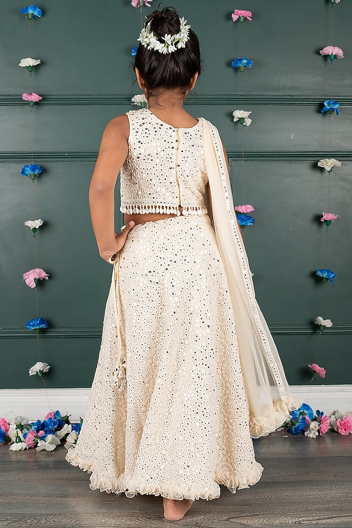 Nude Peach Georgette & Net Embroidered Lehenga Set For Girls by SHRUTI JALAN at Pernia's Pop Up Shop