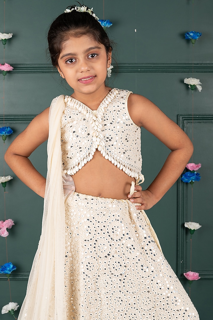 Nude Peach Georgette & Net Embroidered Lehenga Set For Girls by SHRUTI JALAN at Pernia's Pop Up Shop