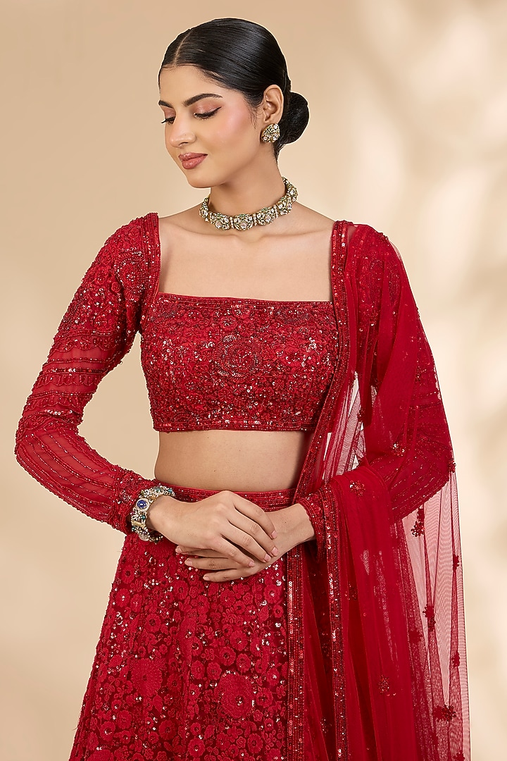 Red Net Thread Embroidered A-Line Wedding Lehenga Set by SHIVA JANGRA at Pernia's Pop Up Shop
