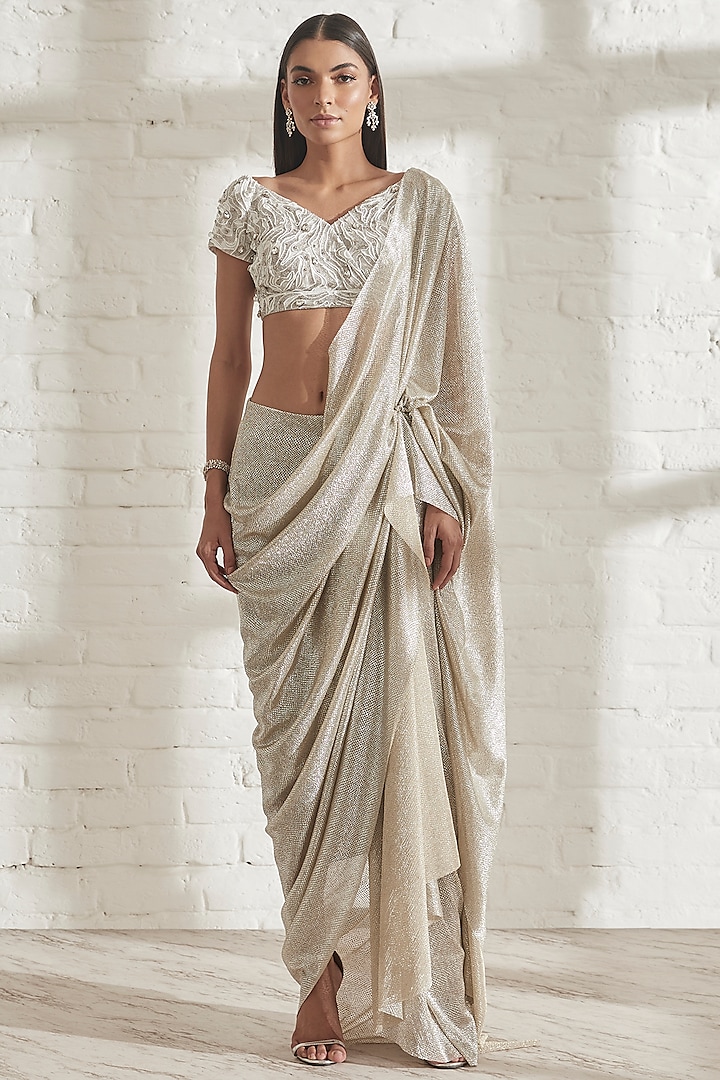 Silver Foiled Net Saree with white river flow nikki blouse by 431-88 By Shweta Kapur