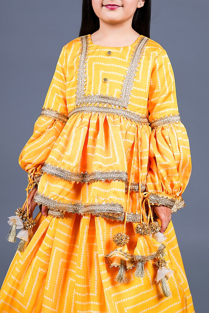 Yellow Cotton & Poly Printed Lehenga Set For Girls by Shining Kanika at Pernia's Pop Up Shop